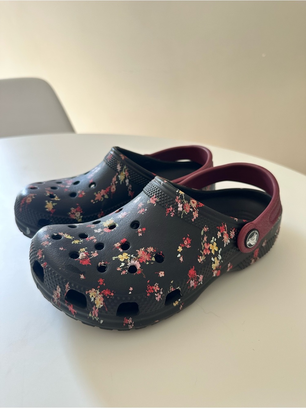 CROCS Kids Black Floral Clogs with Burgundy Heel Strap